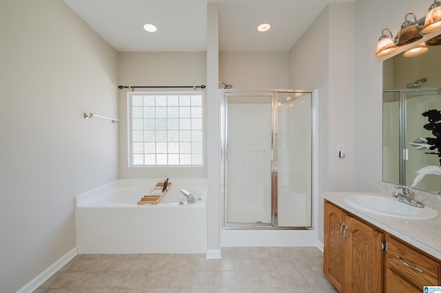 bathroom featuring vanity, separate shower and tub, and tile patterned flooring