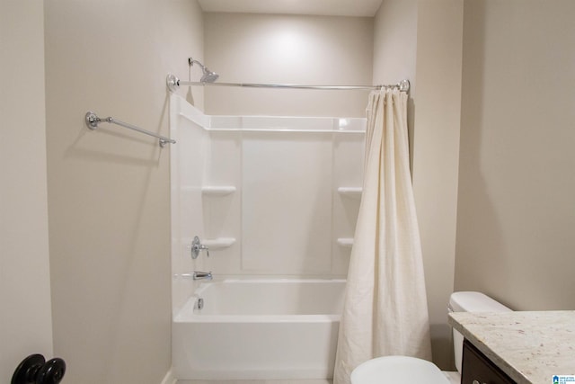 full bathroom featuring shower / bath combination with curtain, toilet, and vanity