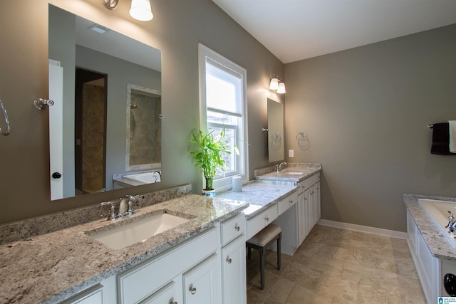 bathroom featuring vanity and separate shower and tub