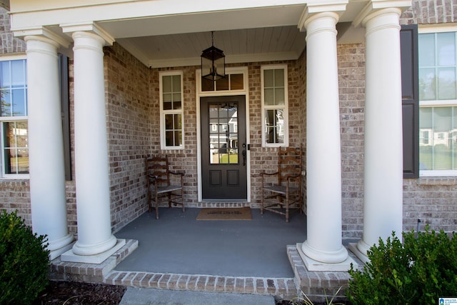 doorway to property with covered porch