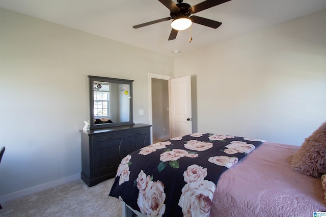 bedroom with light colored carpet and ceiling fan