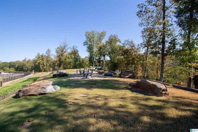 view of community featuring a yard