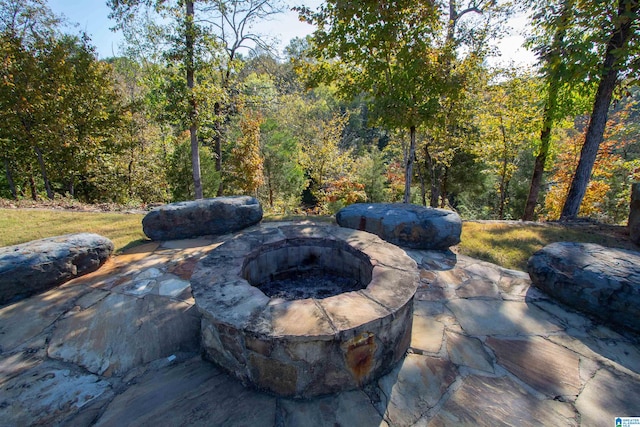 view of patio / terrace with an outdoor fire pit