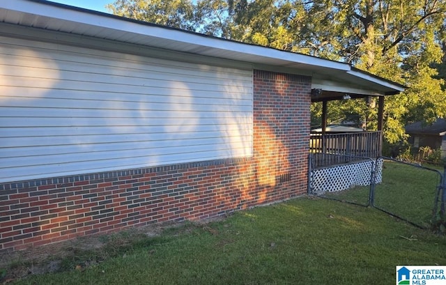 view of home's exterior featuring a yard