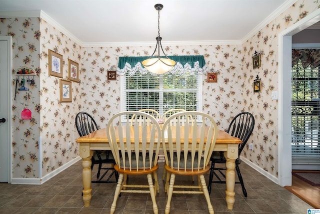 dining space with crown molding and a wealth of natural light