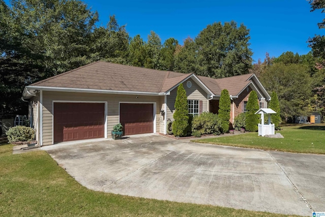 ranch-style home featuring a front yard and a garage