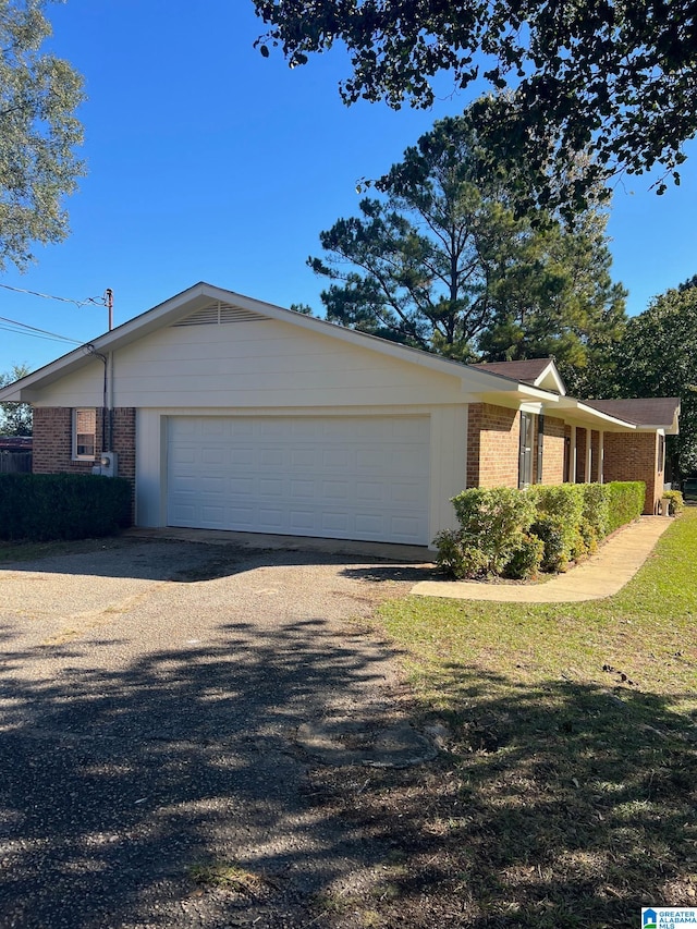 view of property exterior with a garage