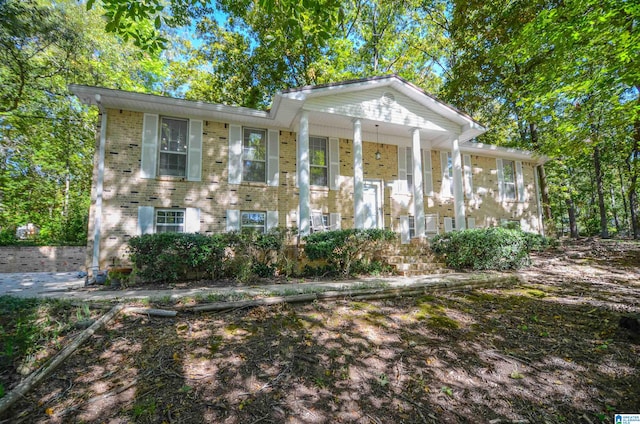 greek revival inspired property with a porch