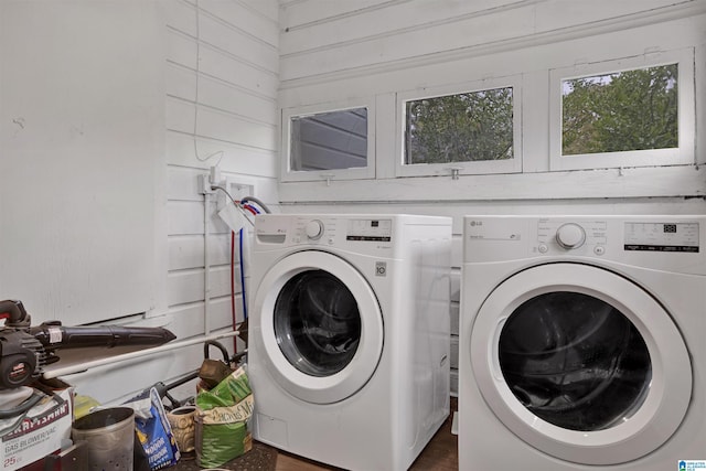 laundry area with laundry area and washer and dryer
