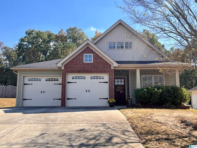 view of front facade featuring covered porch and a garage