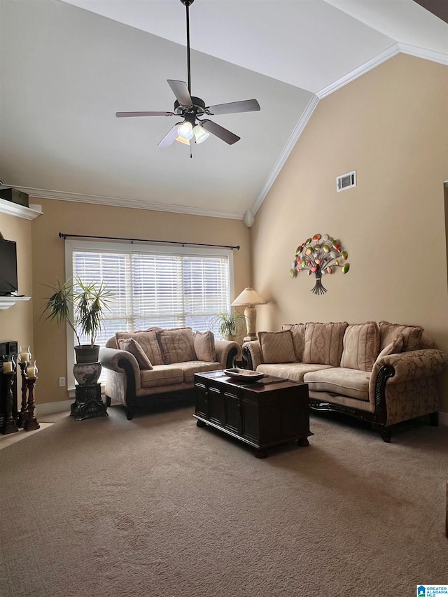 living room featuring lofted ceiling, ceiling fan, ornamental molding, and carpet flooring