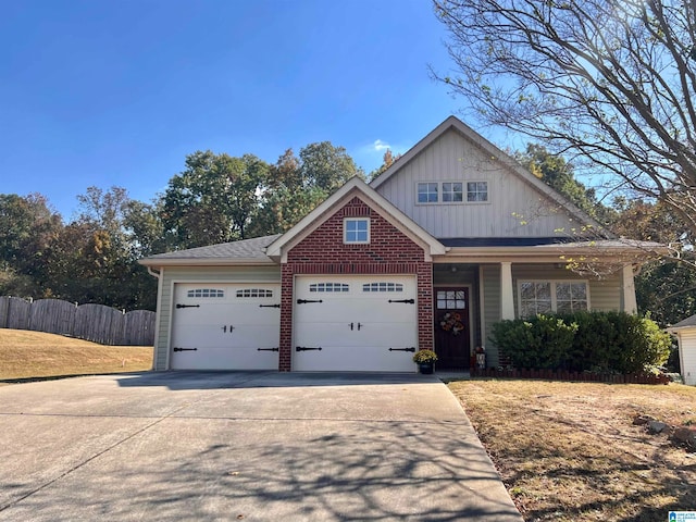 view of front of property with a garage