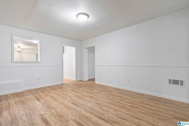 spare room with light wood-type flooring