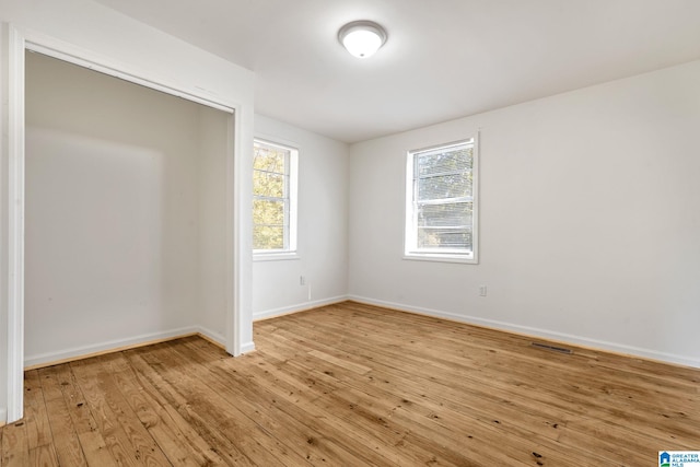 empty room featuring light hardwood / wood-style floors