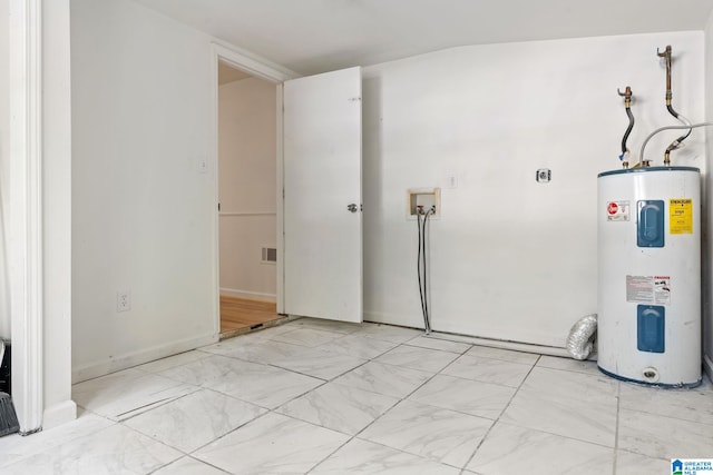 laundry room with hookup for a washing machine and water heater