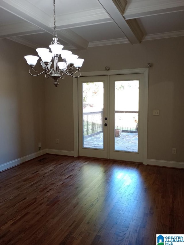 interior space featuring a chandelier, ornamental molding, dark hardwood / wood-style floors, beamed ceiling, and french doors