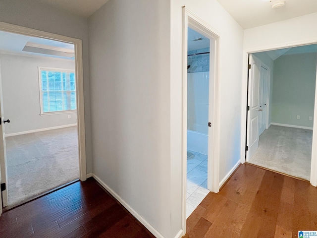 hallway featuring hardwood / wood-style flooring