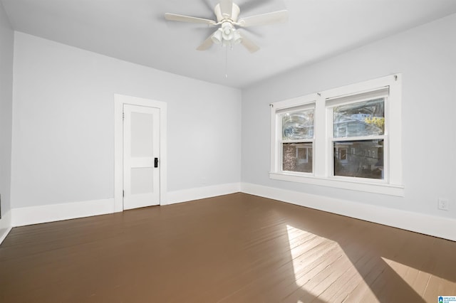 unfurnished room featuring hardwood / wood-style floors and ceiling fan