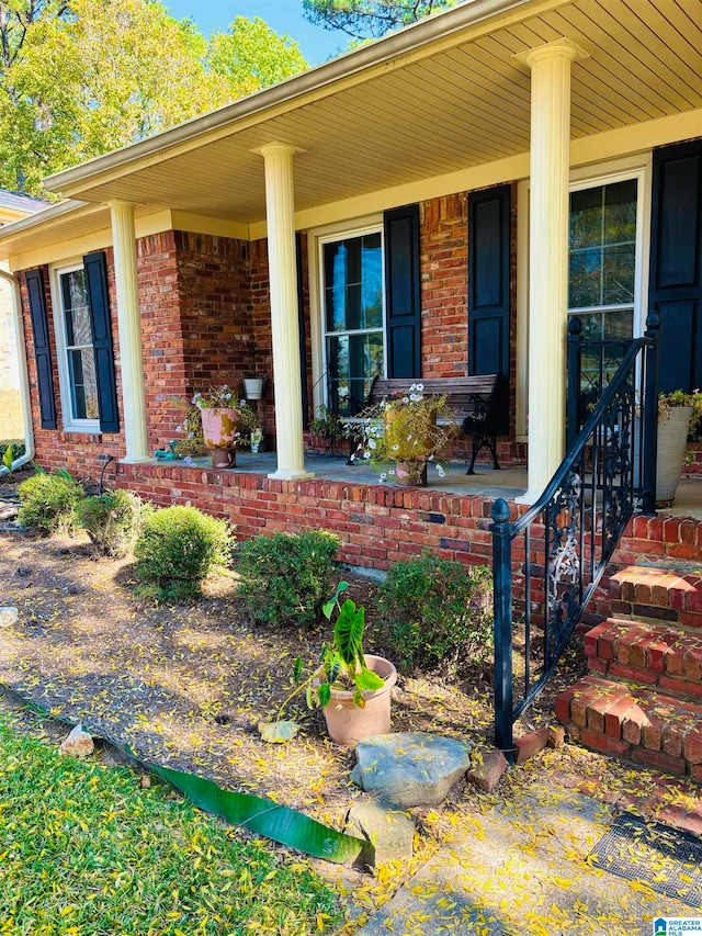 entrance to property with covered porch