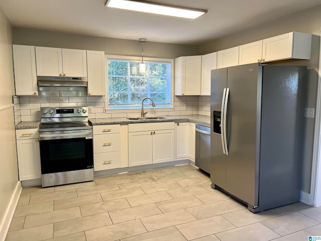 kitchen with stainless steel appliances, sink, and white cabinets