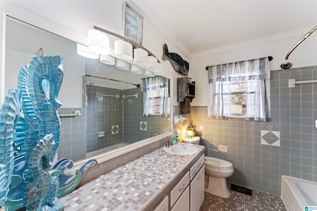 full bathroom featuring tile walls, tile patterned floors, ornamental molding, vanity, and toilet