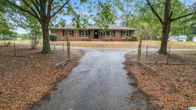 ranch-style house with covered porch