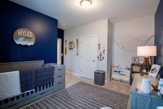 bedroom with light colored carpet