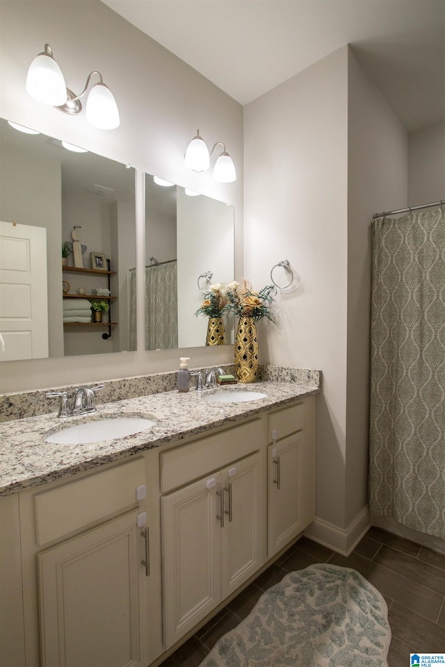 bathroom with vanity and walk in shower