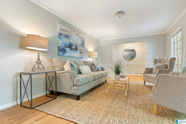 living room with crown molding and hardwood / wood-style flooring