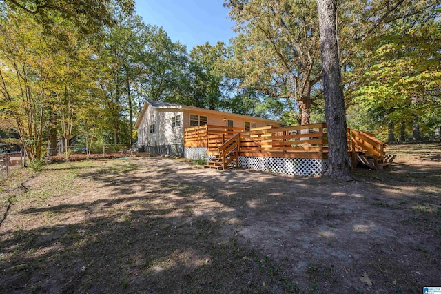 view of yard with a deck