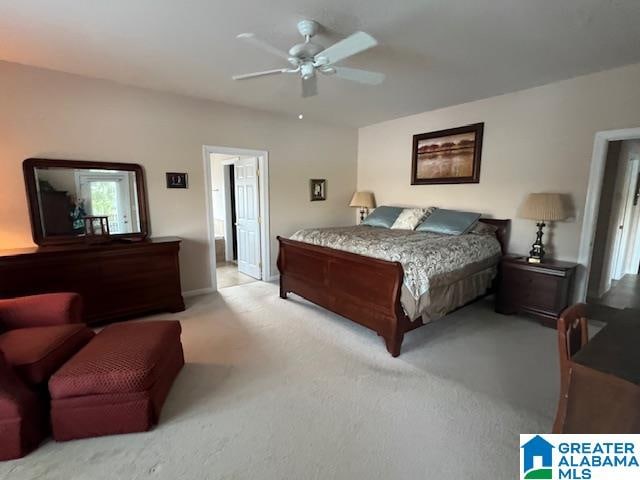 carpeted bedroom with ceiling fan