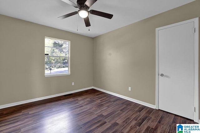 unfurnished room featuring ceiling fan and dark hardwood / wood-style flooring