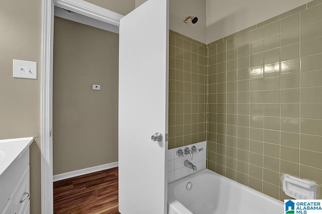 bathroom featuring vanity and hardwood / wood-style flooring