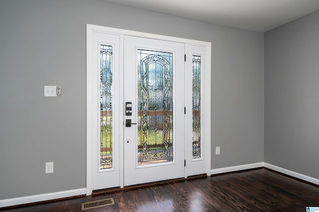 foyer entrance with dark wood-type flooring