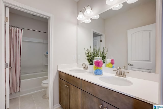 full bathroom with vanity, toilet, shower / bathtub combination with curtain, and tile patterned flooring