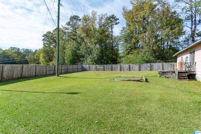 view of yard with a deck