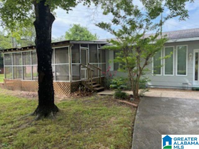 405 Depot St, Columbiana, AL 35051 - view of front of property featuring a sunroom