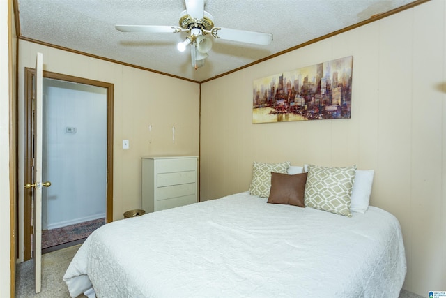 405 Depot St, Columbiana, AL 35051 - carpeted bedroom featuring ornamental molding, a textured ceiling, and ceiling fan