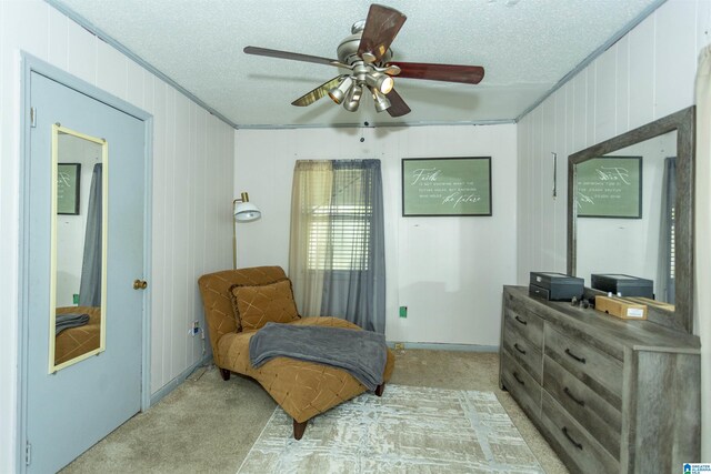 405 Depot St, Columbiana, AL 35051 - living area featuring light carpet, a textured ceiling, and a ceiling fan