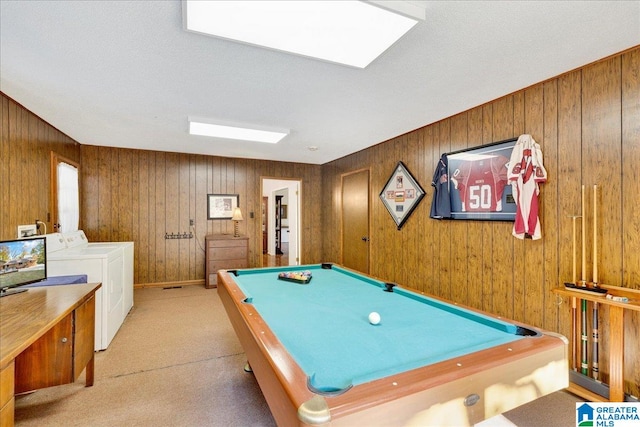 recreation room featuring light carpet, wood walls, pool table, and separate washer and dryer