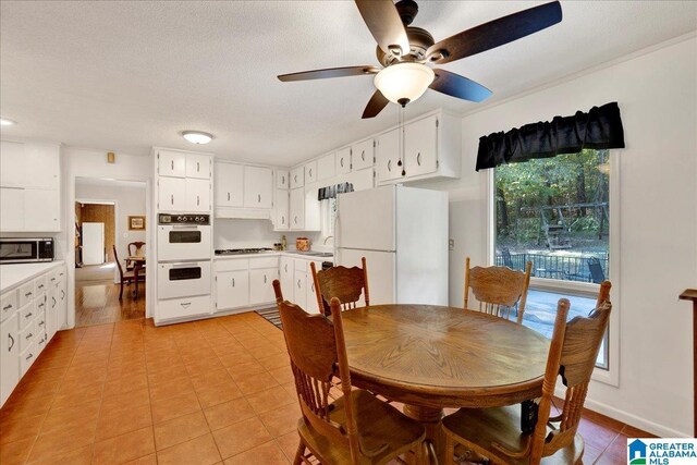 1215 Red Valley Rd, Remlap, AL 35133 - dining space with a ceiling fan and light tile patterned floors