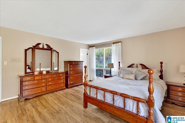 1215 Red Valley Rd, Remlap, AL 35133 - bedroom featuring wood finished floors