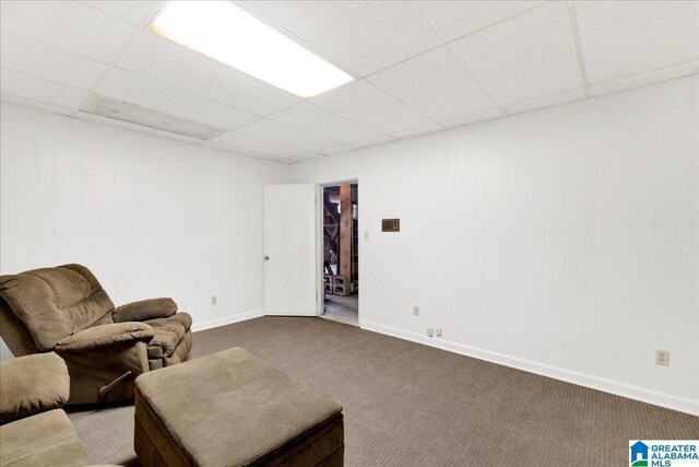 1215 Red Valley Rd, Remlap, AL 35133 - carpeted living area featuring a drop ceiling and baseboards