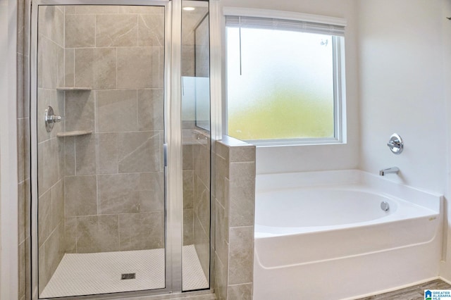 bathroom with independent shower and bath