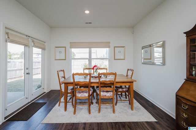 dining room featuring dark hardwood / wood-style flooring