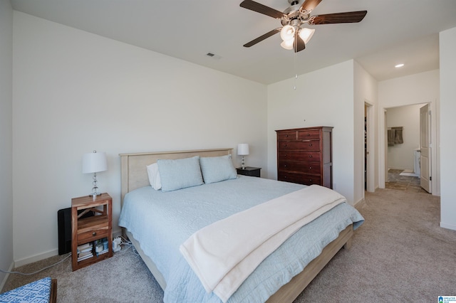 carpeted bedroom featuring ceiling fan