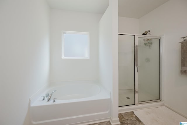 bathroom with independent shower and bath