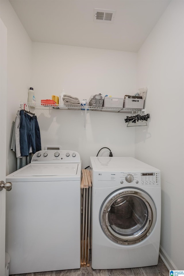 washroom featuring separate washer and dryer