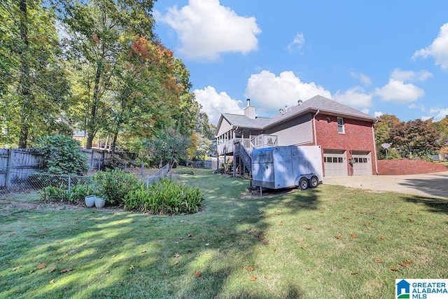 view of yard featuring a garage