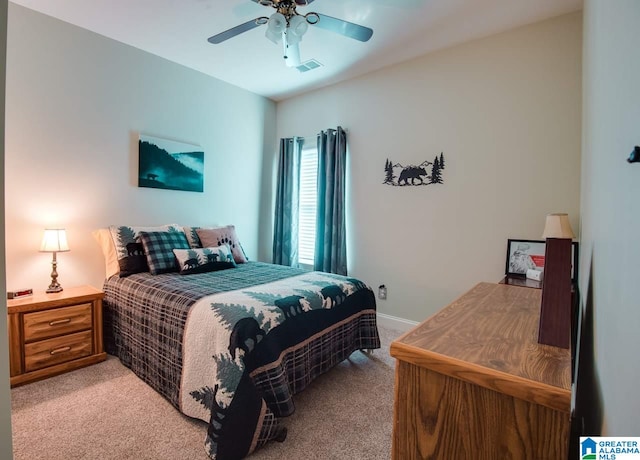 carpeted bedroom with ceiling fan